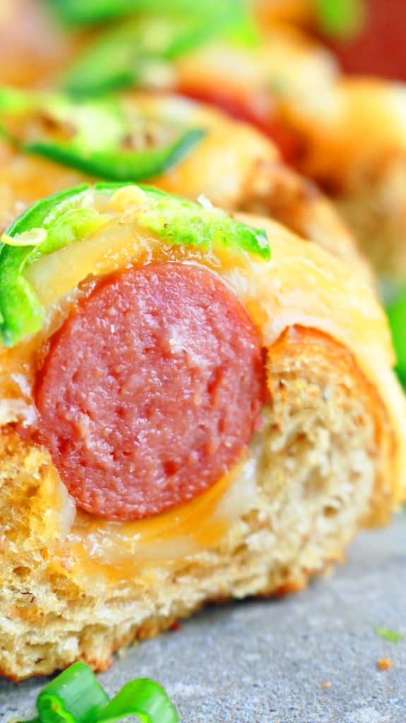 spicy, cheesy garlic bread filled with hot dogs