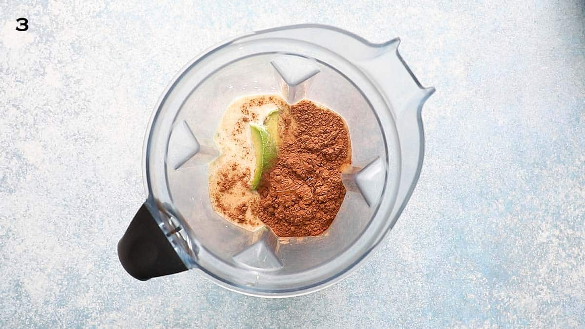 avocado, cocoa powder and milk into a blender.