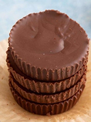 sun butter chocolate cups on a small cake stand.