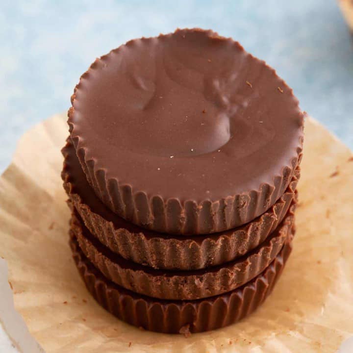 sun butter chocolate cups on a small cake stand.
