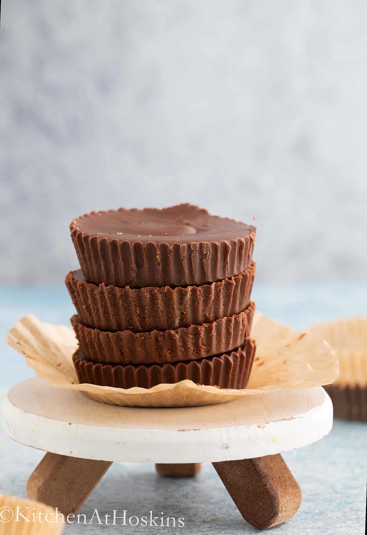 homemade sun butter cups on a small cake stand.
