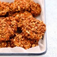 carrot cookies placed in a white enamel tray.