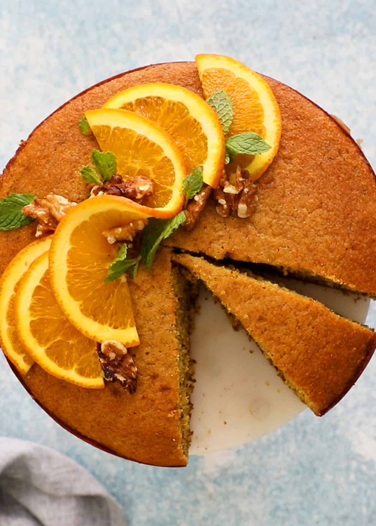 one round cake topped with orange slices.