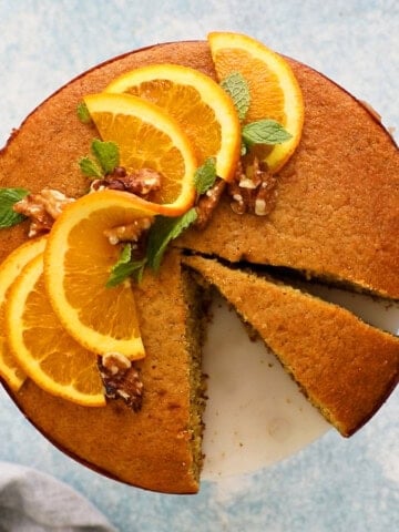 one round cake topped with orange slices.