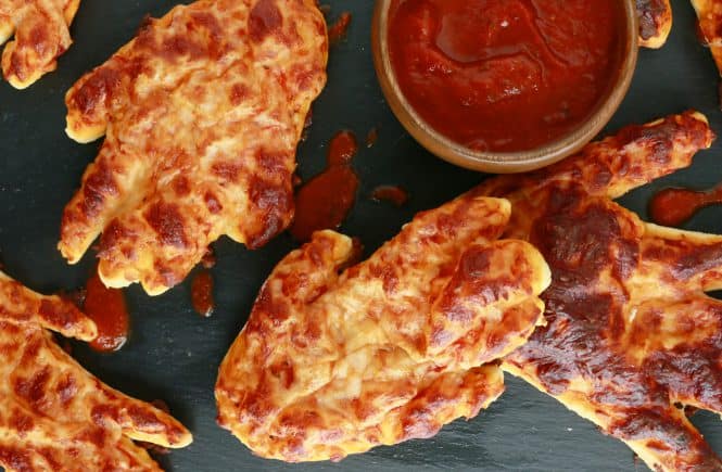 creepy halloween pizza hand