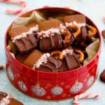 gingerbread cookies in a red cookie tin.