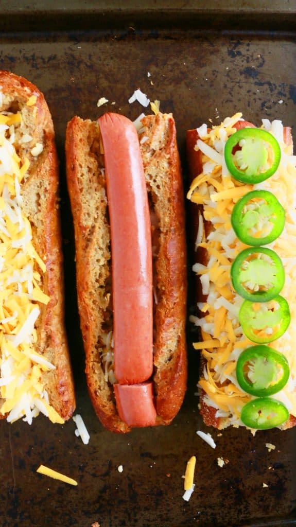 Cheesy garlic bread that is loaded with jalapeños and hot dog.