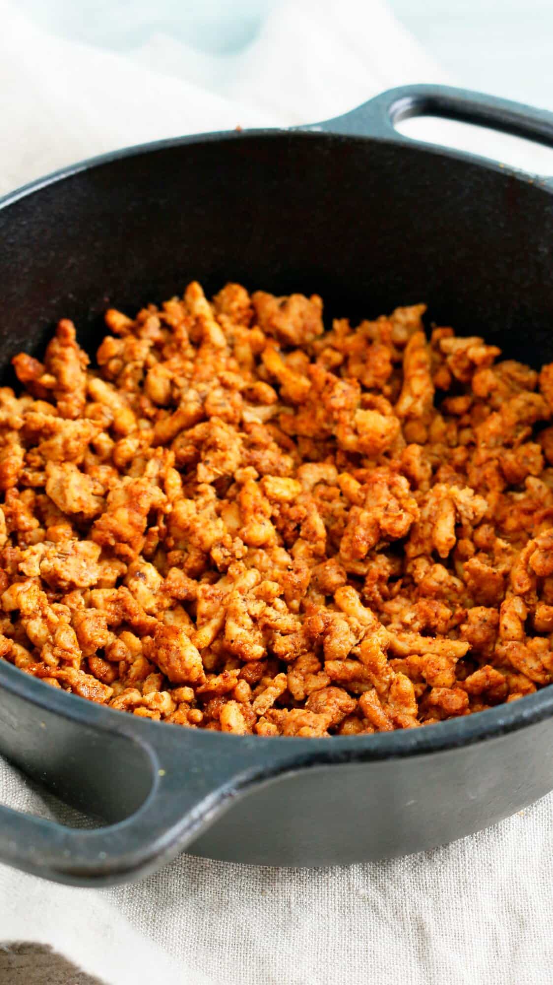 Mexican ground chicken in a cast iron pan. 