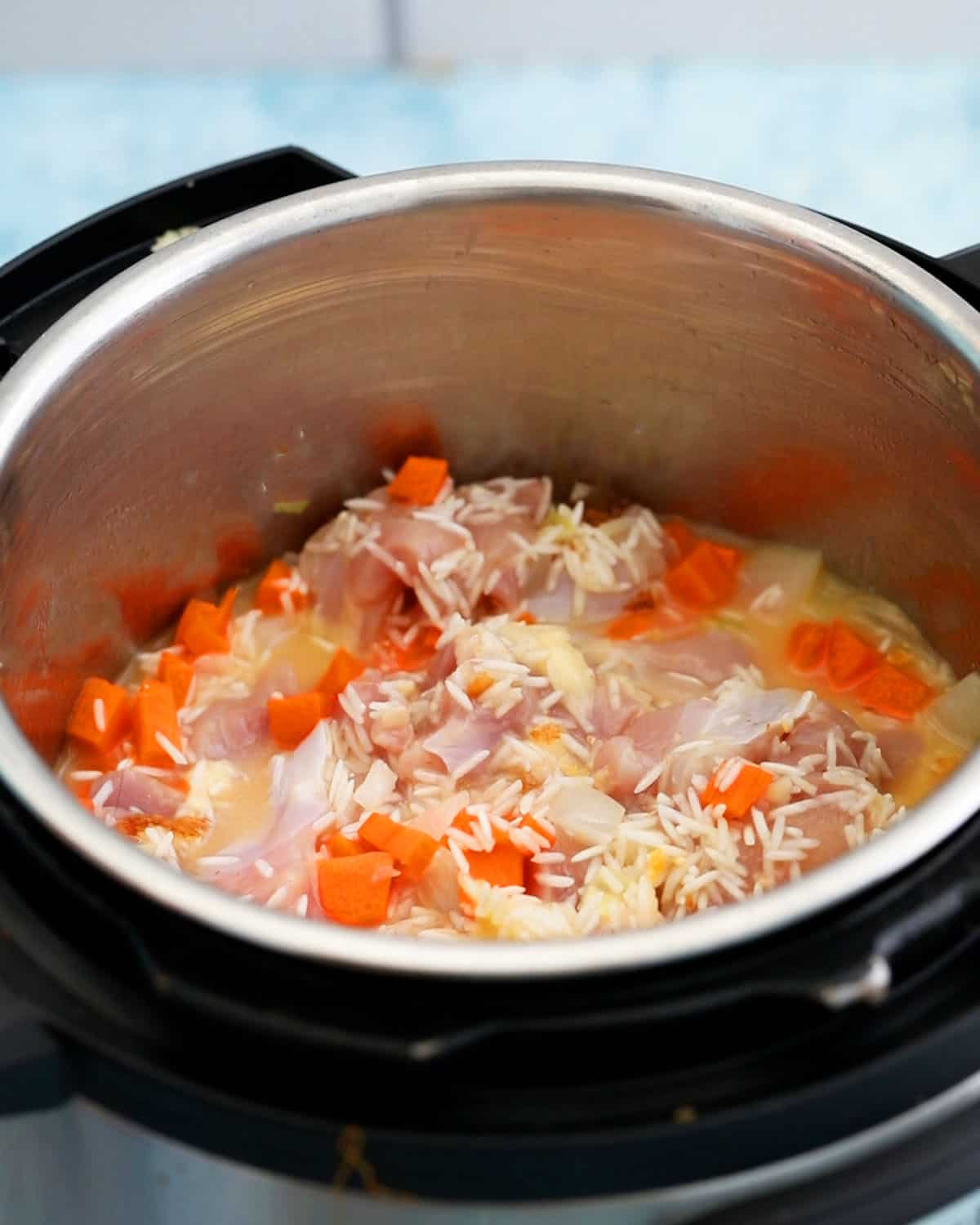chicken fried rice cooking in an instant pot.