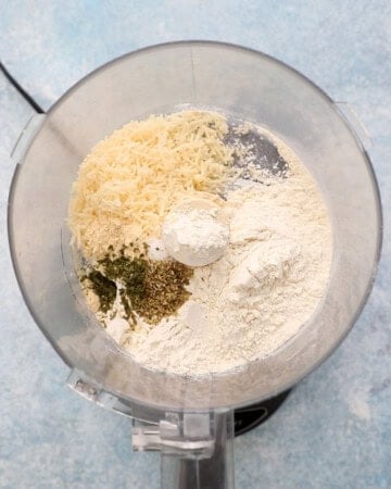 white flour and white cheese in a food processor. 