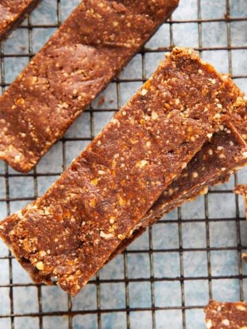 homemade date bars on a wire rack.