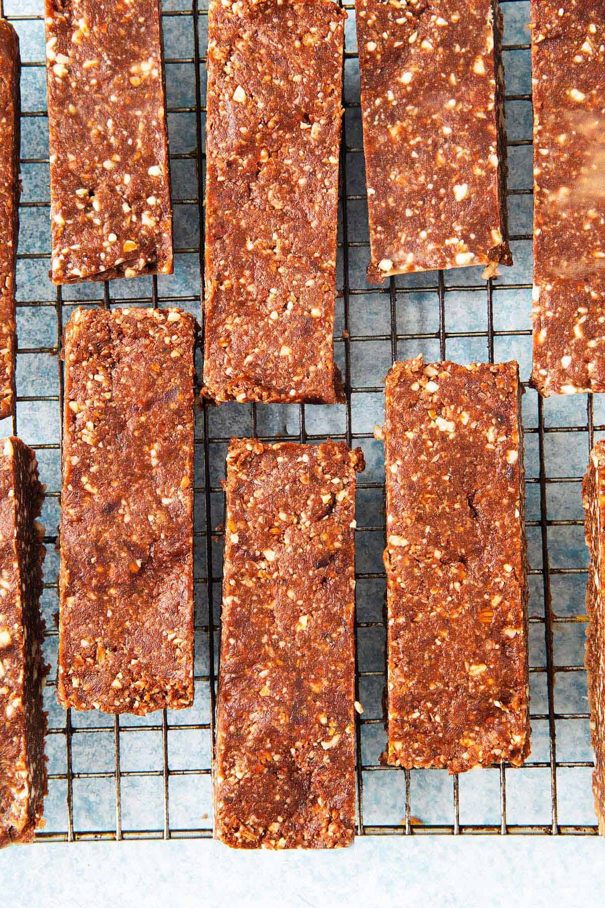 date and nut bars placed on a wire rack.