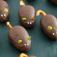chocolate mice on a black board.