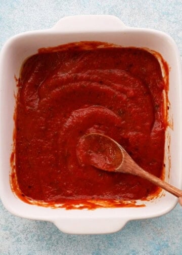 red sauce in a white baking dish.