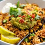 black beans and rice in a white bowl.
