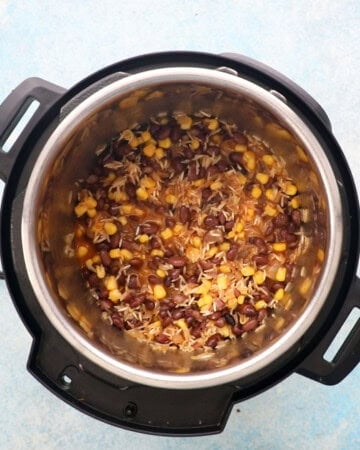 black beans and rice cooking in an instant pot.