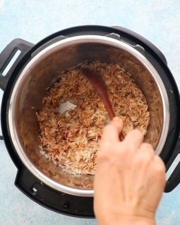 black beans and rice cooking in an instant pot.