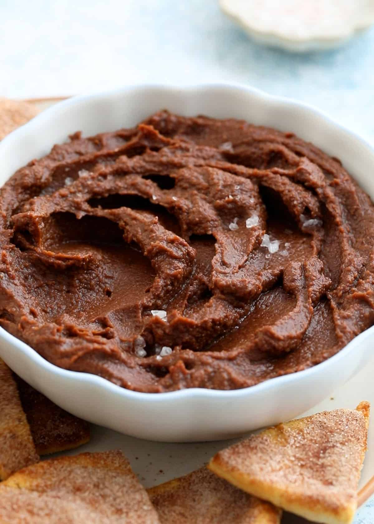 chocolate hummus in a white bowl.