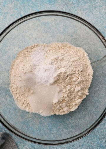 white flour in a large glass bowl.