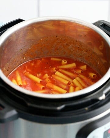 red sauce and yellow pasta in an instant pot.