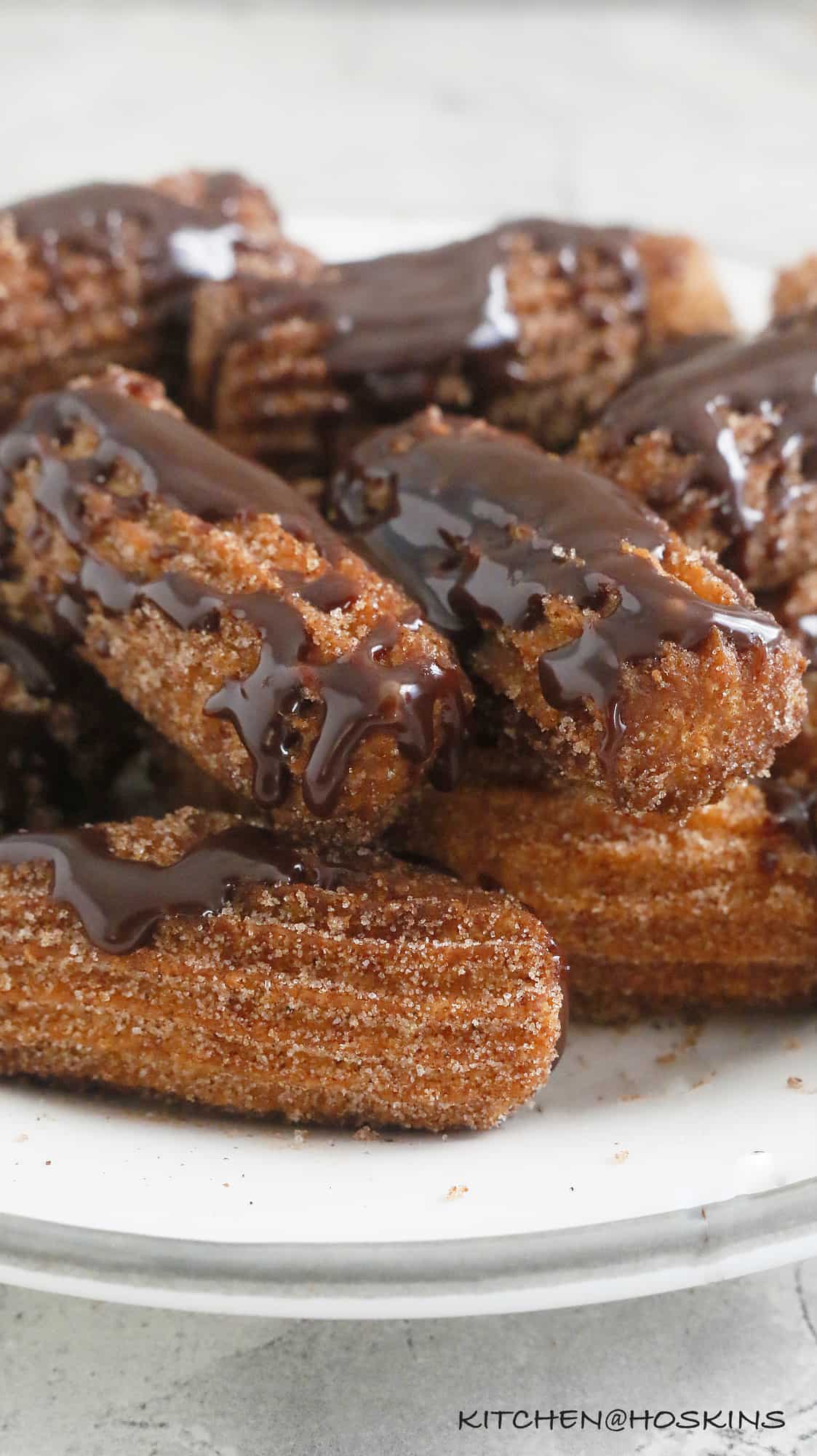 deep fried churros with chocolate sauce