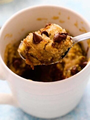 a spoon of banana cake from a mug.