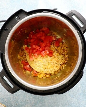 dal, chopped tomato and onion in an instant pot.