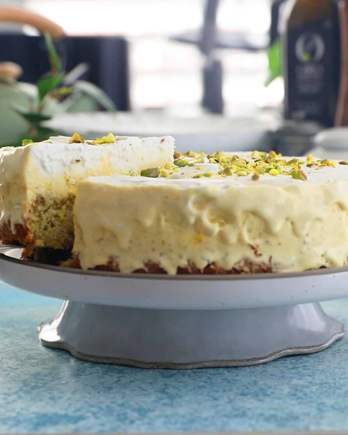 one yellow pistachio ice cream cake in a white plate.