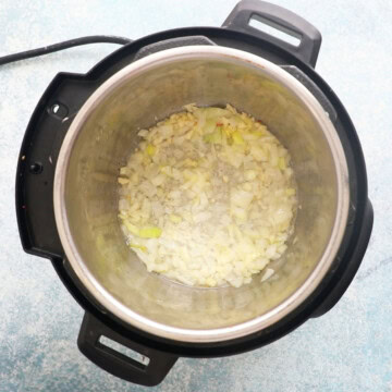 chopped onion cooking in an instant pot.