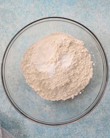 white flour in a glass bowl.