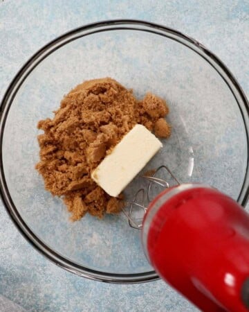 white butter and brown sugar in a glass bowl.