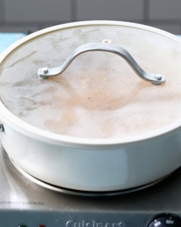 white pan covered with a white lid.