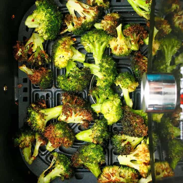 hot crispy air fried broccoli in an air fryer