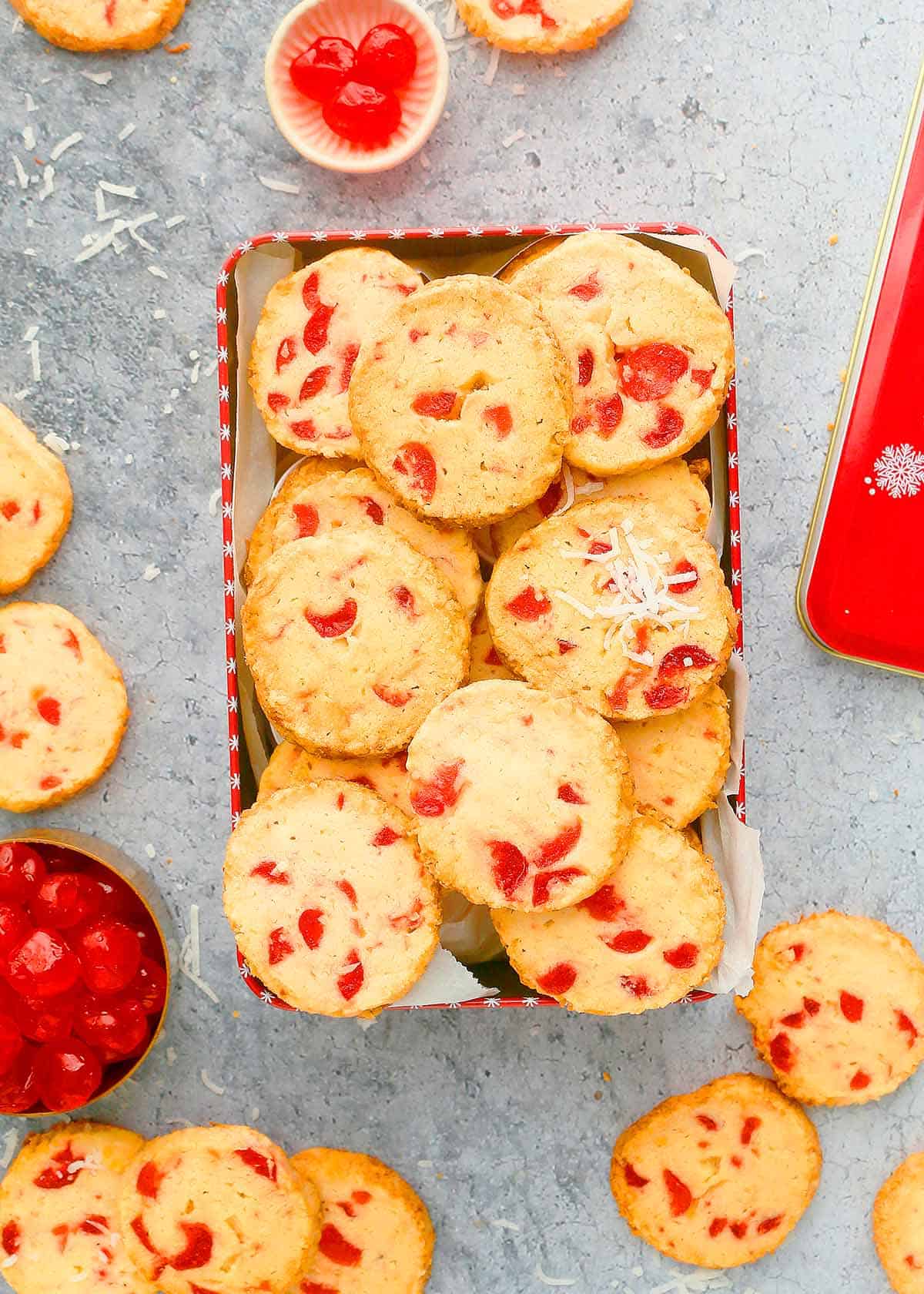 a red box filled with baked cookies.