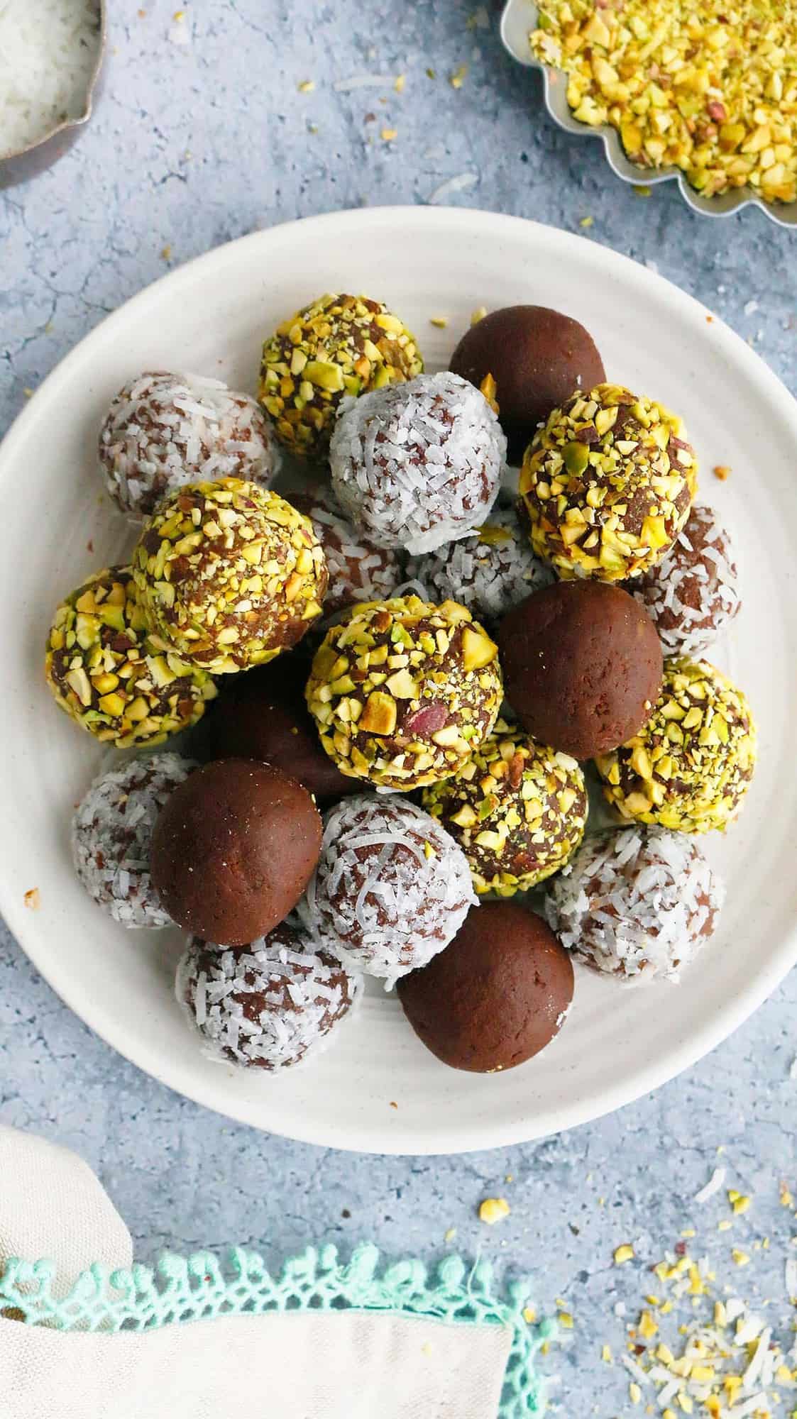 white plate with chocolate truffles made with avocado.