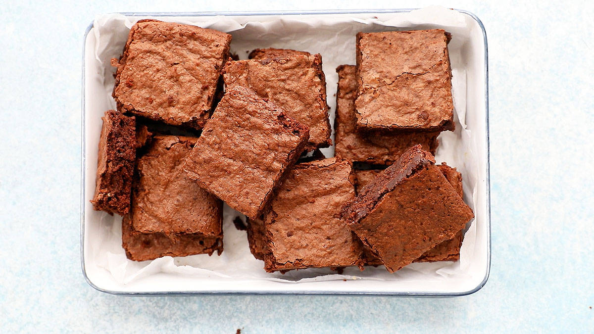 white tray with baked almond flour brownies.