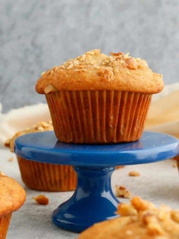 egg free banana muffin placed on a blue stand