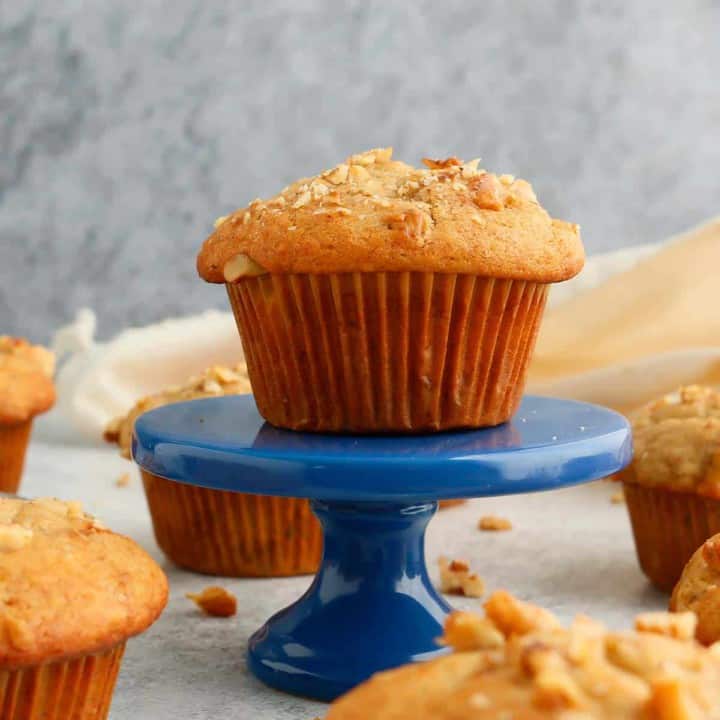 egg free banana muffin placed on a blue stand