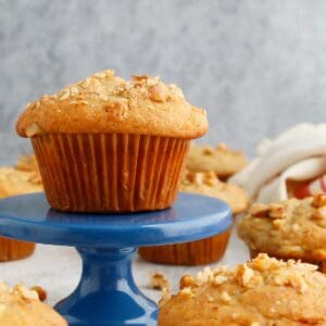 one muffin placed on a blue stand.