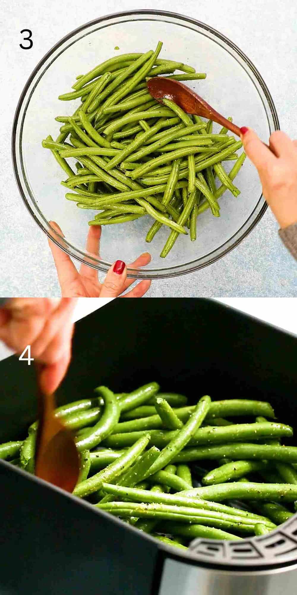 a hand tossing and placing green beans in an air fryer basket.