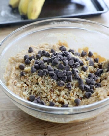 almond flour banana muffin batter in a glass bowl.