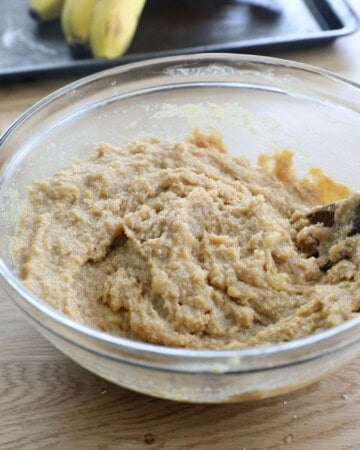 almond flour banana muffin batter in a glass bowl.