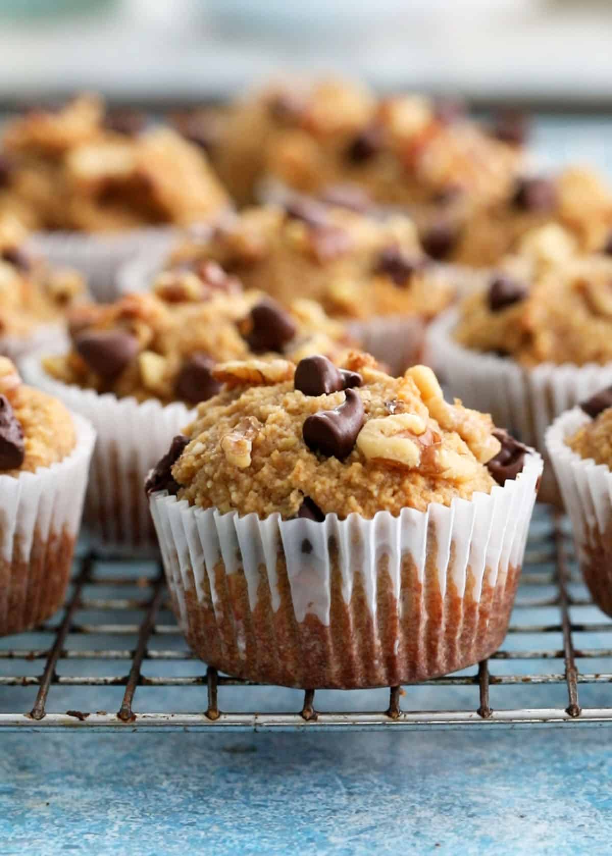 almond flour banana muffins on a wire rack.