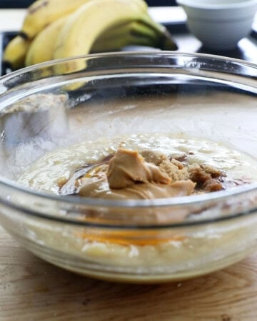almond flour banana muffin batter in a glass bowl.