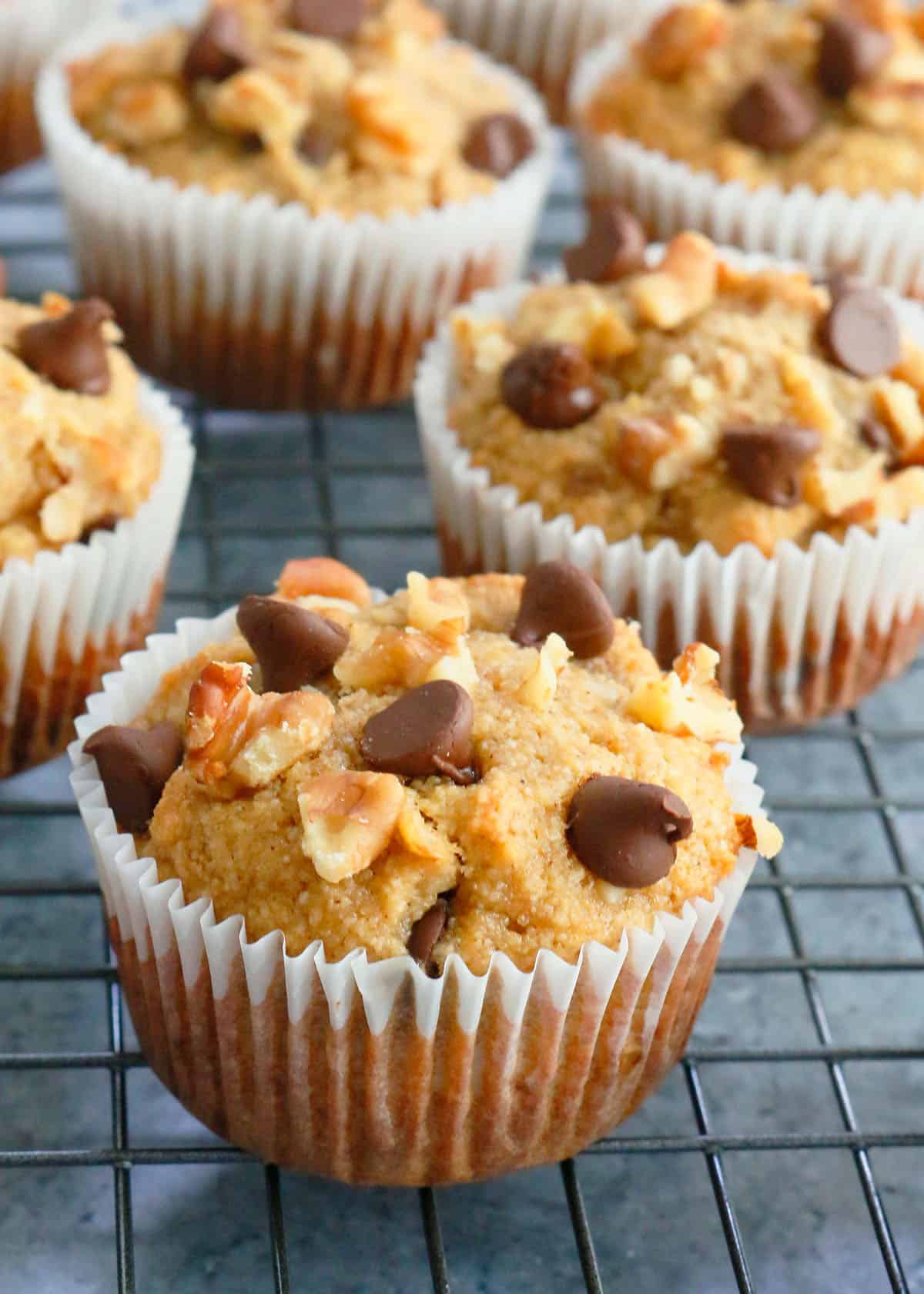 almond flour banana muffins on a wire rack.