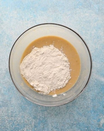 banana cake batter in a glass bowl.