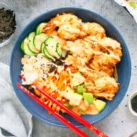 spicy shrimp sushi bowl with chopsticks