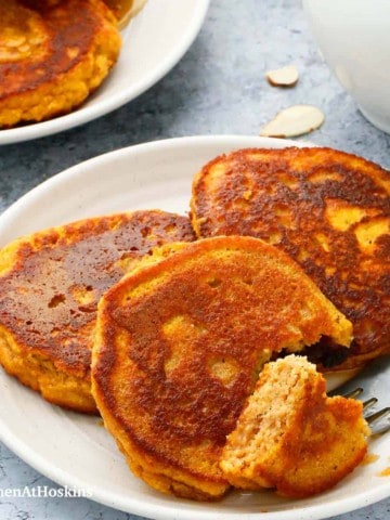 gluten free pumpkin pancakes in white plates