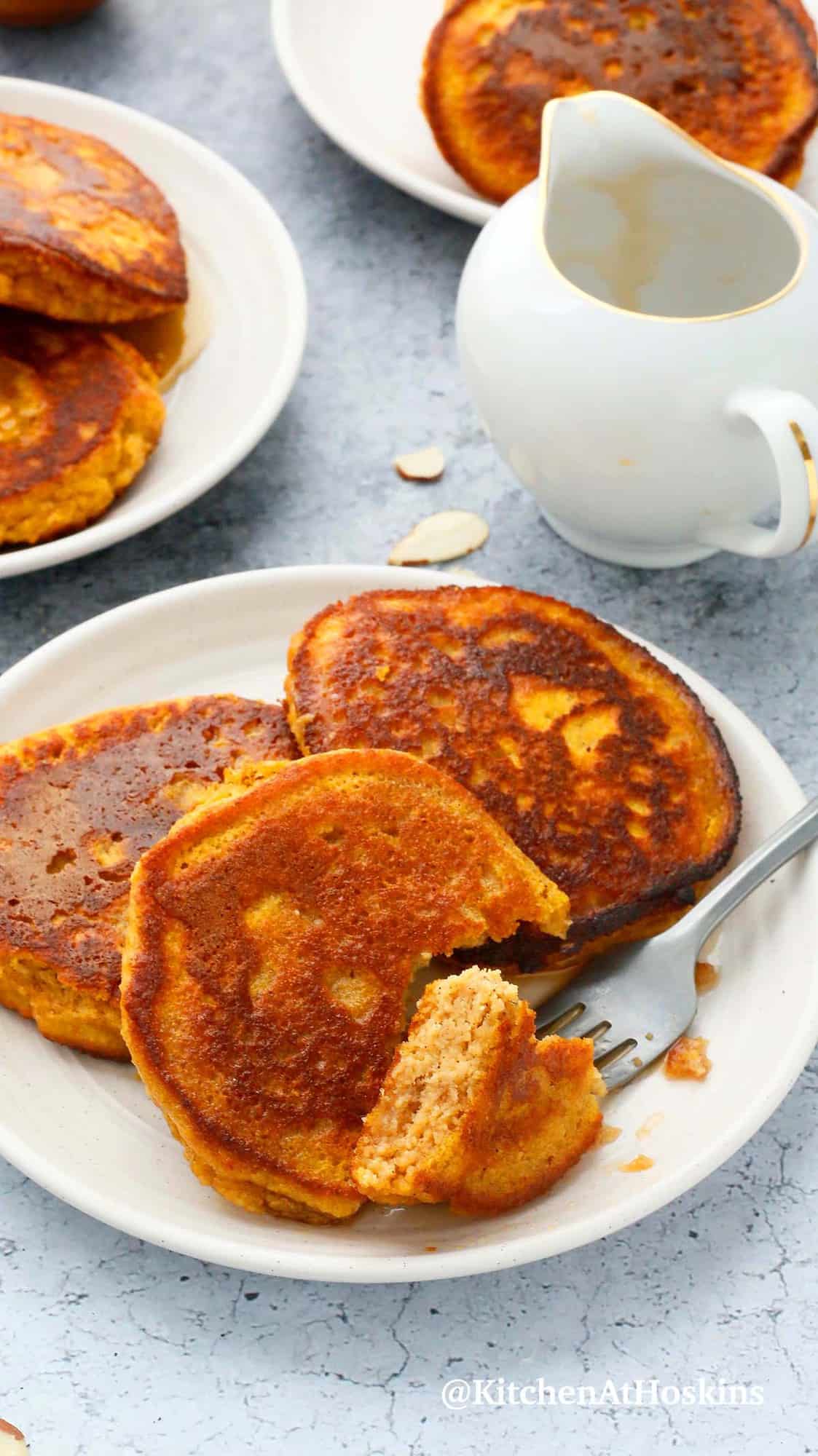 almond flour pumpkin pancakes on white plates