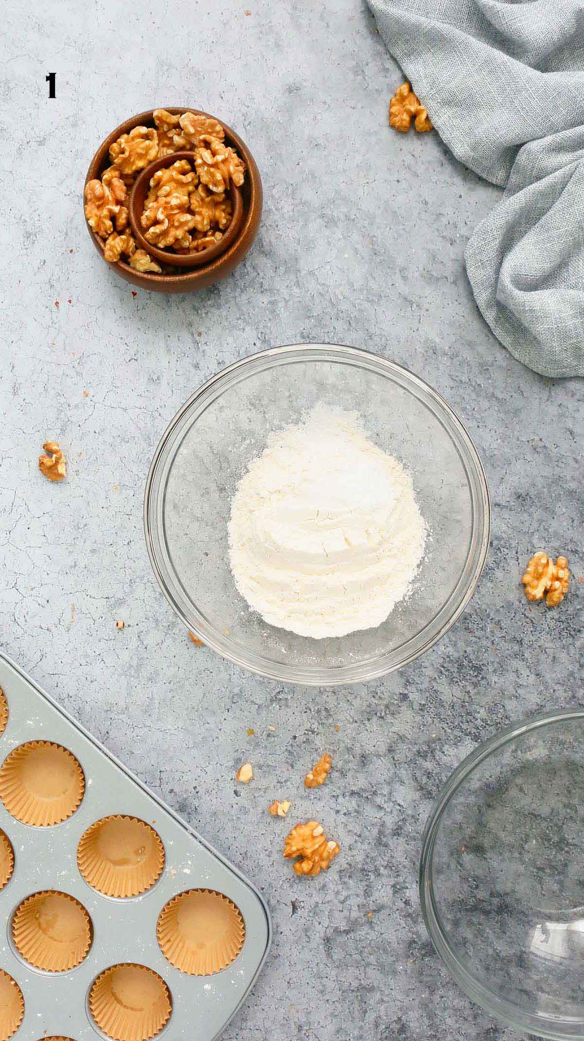 glass bowl with white flour.